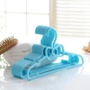 Modern and simple plastic daily necessities green clothes hangers factory direct sales Application Scenario